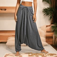 Embrace effortless style with our Casual Loose Hippie Balloon Pants. These drop harem pants offer a relaxed fit and bohemian flair, perfect for a laid-back, free-spirited look. Enjoy the ultimate in comfort and fashion with these unique and versatile pants. Please message me with any comments or questions.  **The Size Chart is in cm** Bellow is inches                  Waist                     Length  S             25.1in                        41in M             26.7in                      41in L              28.3in                      41in XL            30in                        42in 2XL        31.4in                        42in Solid Color High Waist Baggy Harem Pants, High Waist Baggy Solid Color Harem Pants, High Waist Baggy Harem Pants, Baggy High Waist Gray Harem Pants, Baggy Yoga Trousers For Spring, Gray Baggy High Waist Harem Pants, Baggy Gray Harem Pants For Summer, Summer Baggy Gray Harem Pants, Gray Baggy Ankle-length Wide Leg Pants