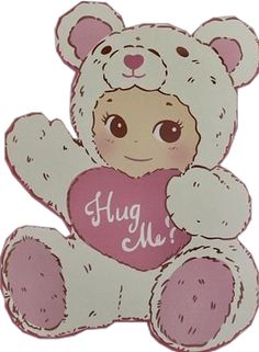 a white teddy bear holding a pink heart with the word hug me written on it