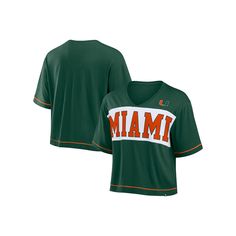 Easily highlight your Miami Hurricanes fandom with this Home Team Bold Fashion Modest T-shirt. Designed by Fanatics, it features a trendy cropped hem, a stylish V-neckline and contrast-color striping that accentuates the vibrant team graphics printed across the front. Blended material makes this Miami Hurricanes tee comfortable to wear all day.Easily highlight your Miami Hurricanes fandom with this Home Team Bold Fashion Modest T-shirt. Designed by Fanatics, it features a trendy cropped hem, a s Collegiate V-neck Top With Letter Print, Collegiate Style Cotton V-neck Top, Sporty Green Tops For Fan Gear, Green Top With Team Logo For Fan Gear, Green Tops With Team Logo For Fan Gear, V-neck T-shirt With Letter Print For College, Short Sleeve Tops For Fan Apparel, Short Sleeve Tops For Fan Gatherings, Collegiate Green Top With Team Logo