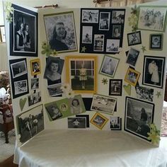 a white table topped with pictures and photos