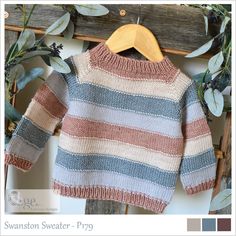 a striped sweater hanging on a wooden hanger next to eucalyptus leaves and branches with the words swanson sweater - py9