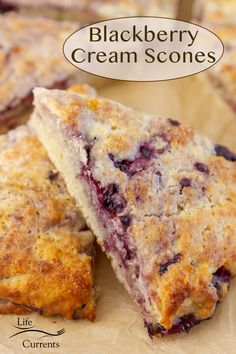 blueberry cream scones stacked on top of each other with the words, life currents