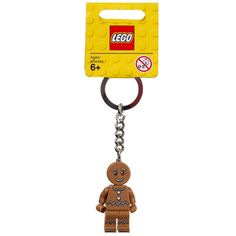 a lego keychain with a small figure on it's front and back