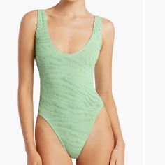 Allover Texturing Defines This Classic One-Piece With A Scooped-Out Low Back, High Legs And Enough Stretch To Adjust The Coverage However You Like. Summer Fitted One-piece With Scoop Neck, Summer Scoop Neck Bodysuit For Vacation, Summer Bodysuit With Scoop Neck For Vacation, Green Scoop Neck Bodysuit For Beach, Green Scoop Neck Bodysuit For The Beach, Green Scoop Neck Swimwear For Beach Season, Green Summer Swimwear With Scoop Neck, Green Scoop Neck Summer Swimwear, Green Scoop Neck Swimwear For Vacation