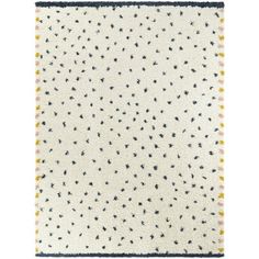 a white rug with black and yellow stars on the bottom, in front of a white background