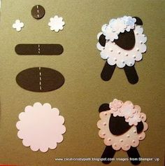 the sheep are made out of paper on the wall