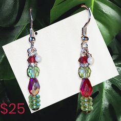 You're a mean one Mr Grinch! These delightful festive earrings are made from Swarovski crystals and represent that rascally Grinch. A conversation starter to be sure this holiday season. Hypoallergenic ear wires. 1" long. Single Crystal Earring As A Gift, Holiday Dangle Earrings With Ear Wire, Nickel-free Drop Earrings For Holiday, Christmas Beaded Dangle Earrings With Ear Wire, Christmas Dangle Beaded Earrings With Ear Wire, Dangle Crystal Earrings With Czech Glass For Gift, Czech Glass Crystal Dangle Earrings As Gift, Czech Glass Dangle Crystal Earrings For Gift, Christmas Beaded Drop Earrings