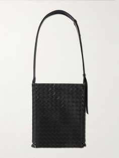 "When creating a Bottega Veneta bag, we count days, not hours, " says the brand. Artisans in Italy have handcrafted this messenger bag by meticulously weaving strips of leather in the signature intrecciato technique. It's roomy enough to carry your tablet, water bottle and a hard case for your sunglasses. Count Days, Leather Messenger Bag Men, Bottega Veneta Bag, New Bottega, Latest Bags, Bottega Veneta Intrecciato, Messenger Bag Men, Crossbody Messenger Bag, Leather Messenger Bag