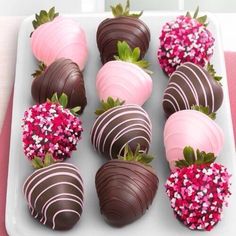 chocolate covered strawberries are arranged on a plate