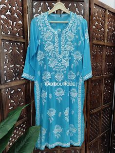 Description ▪ Kurti Fabric: Modal ▪ Kurti Length: 44-46 Inches ▪ Sleeves: 3/4 Sleeves ▪ Style: Straight Kurti ▪ Occasions: Party Wear, Office Wear, Festive Wear ▪ Garment Care: Hand Wash Only ▪ Price Includes: 1x Kurti Blue Chikankari Embroidery Kaftan For Summer, Blue Straight Kurta With Chikankari Embroidery, Blue Chickenkari Kurti, Indigo Chikankari Embroidery Straight Kurta, Blue Chikankari Embroidered Straight Kurta, Kurta Women, Style Kurti, Straight Kurti, Sleeves Style