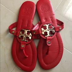 Tory Burch Red Sandals Red Leather Sandals With Single Toe Strap, Red Flat Sandals With Removable Insole, Red Sandals With Single Toe Strap For Vacation, Designer Sandals With Red Sole And Round Toe, Designer Red Leather Sandals, Red Sandals With Cushioned Footbed And Flat Heel, Red Flat Sandals With Leather Footbed, Designer Closed Toe Red Sandals, Designer Red Closed Toe Sandals