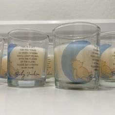 four glasses with winnie the pooh quotes on them