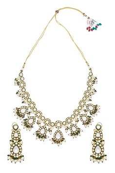 Gold plated drop pattern necklace studded with white polki, green beads and pearl tassels. Comes with matching earrings. - Aza Fashions Elegant White Kundan Necklace With Dangling Beads, Elegant White Kundan Necklace With Latkans, Elegant Green Kundan Necklace With Latkans, Elegant White Necklace With Latkans, Traditional White Teardrop Necklaces, Traditional White Teardrop Necklace, Festive White Jewelry With Dangling Beads, Elegant Green Kundan Necklace With Dangling Beads, Festive White Kundan Necklace With Dangling Beads