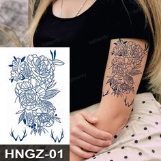 a woman with flowers on her arm and the words hngz - 01 written in blue ink