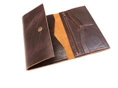 "Add a matching wallet or pouch for your bag. It will come in the same leather color as the bag purchased. Cowhide option is for cowhide bags. Not sold separately! ❗️WALLET SIZE:  8\" long and 4 1/2\" wide.  15\" when fully open  This is a large, tri- food leather wallet/ passport holder with heavy duty snap.   It's elegant and stylish, great for everyday use or for your holiday travels. This is a large wallet. It has plenty of pockets and compartments with a zippered pocket. It can hold your cr Brown Trifold Wallet With Zipper For Daily Use, Brown Bifold Wallet With Zipper Pocket, Brown Trifold Coin Purse For Travel, Brown Bifold Coin Purse For Travel, Brown Travel Clutch With Interior Card Slots, Brown Bifold Clutch With Zipper Closure, Bifold Wallet With Zipper Pocket As Gift, Bifold Clutch With Coin Pocket For Travel, Brown Bifold Clutch For Travel