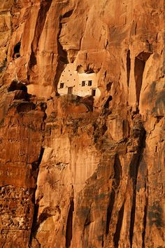 a house built into the side of a cliff