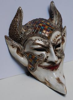 Full Face Devil Mask. Size: one size Original papier-mache Venetian mask, handmade and decorated with stucco and acrylics. This mask is very colorful. All our masks are handmade papier-machè masks made in Venice. Our decorators use techniques typical of the Venetian tradition such as stucco, acrylics, gold and silver-leaf, macramè, passementerie, pearls and crequelè to give you a wide range of masks. The mask could be slightly different because are all handmade and each mask is one of kind We sh Fantasy Carnival Mask For Festivals, Fantasy Masks For Carnival And Festivals, Artistic Masks For Festivals And Costume Parties, Artistic Masks For Costume Party And Festivals, Artistic White Masks For Festivals, Artistic Masks For Costume Festivals, Artistic Costume Masks For Festivals, Multicolor Full Face Carnival Mask, Handmade Artistic Masks For Carnival