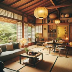 a living room filled with lots of furniture next to a large open window covered in hanging lanterns