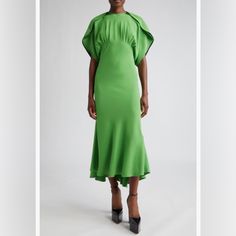 Victoria Beckham Gathered Dolman Sleeve Dress Dolman Sleeves Provide A Grace Note To A Verdant Dress That Makes A Striking Statement. V-Neck Elbow-Length Sleeves 50% Viscose, 47% Acetate, 3% Elastane Dry Clean Made In Portugal Color: Shamrock 2 Us / 6 Uk $1190 New To Poshmark? Sign Up Using The Code Limitedgems And Save $10 On Your Purchase! Fitted Green Midi Dress With Draped Sleeves, Green Fitted Dress With Draped Sleeves, Chic Green Dress With Draped Sleeves, Green Midi Dress With Draped Sleeves, Chic Green Midi Dress With Draped Sleeves, Green Evening Dress With Cape Sleeves, Green Cape Sleeve Evening Dress, Green Fitted Dress With Cape Sleeves, Green Cape Sleeves Dress For Evening