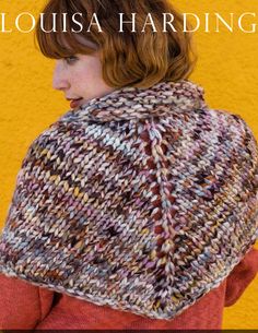 a woman wearing a knitted shawl with the words, louisa hading on it