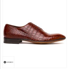 Caporicci 2543 Dark Gold Brown Alligator Leather Oxford Retail $2799.00 Made In Italy Color/Material: Dark Gold Brown Alligator Lace-Up Closure Lightly Padded Leather Insole Smooth Leather Sole 1 Inch Heel I Do Have Other Sizes (7.5-16) Just Ask Me. Clearing House. *Box’s Is Kind-Of Beat Up. Caporicci 1208 Genuine Alligator Apron Toe Penny Loafers Dark Gold Brown Beautiful Genuine Alligator Apron Toe Penny Loafers, Featuring Fine Stitch Detailing And Leather Sole. Caporicci Exotic Shoes Exemplif Luxury Crocodile Pattern Oxfords, Designer Crocodile Pattern Dress Shoes For Business, Luxury Leather Shoes With Crocodile Pattern, Luxury Business Oxfords With Crocodile Pattern, Luxury Crocodile Pattern Oxfords For Business, Luxury Crocodile Pattern Leather Shoes, Elegant Brown Crocodile Pattern Oxfords, Luxury Crocodile Pattern Oxfords For Semi-formal Occasions, Luxury Crocodile Pattern Oxfords For Semi-formal Events