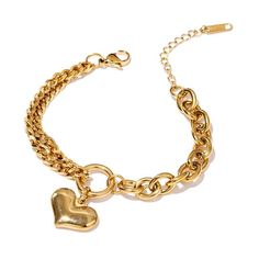 This is a super, on-trend heart charm bracelet with mixed chain. The chain is a combination of curb and rolo style. The heart is an elegant, puffed heart motif. It is adjustable from about 6.5-7.5” and is plated in real gold. It will match other 14k gold pieces very nicely if your stacking with other gold pieces. This would make a wonderful gift that any woman would cherish. Textured Bracelet, Sentimental Jewellery, Heart Choker Necklace, Heart Pendant Gold, Jewelry Fashion Trends, Pendant Bracelet, Metal Bracelets, Jewelry Lover, Heart Charm Bracelet