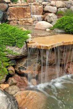 an image of a waterfall in the middle of some rocks and water with text overlay