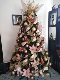 a decorated christmas tree in a living room