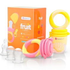 the fruit baby bottle is next to its packaging box and it's contents are shown