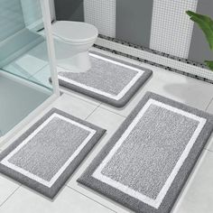 3 piece bathroom rug set in grey and white