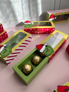 the grinch boxes are open and ready to be filled with chocolates for christmas