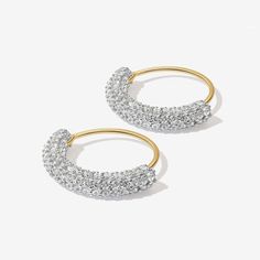 How cute are these crystal hoops? Saz's sweet crystal half hoop design, on a mini huggie setting, makes it a go-to earring for just about any outfit. We recommend styling alongside our Allum and Sim hoops for ultimate accessorizing. Utilizing a luxury 14 karat gold plating, these Adorn Luxe earrings are everything you love about our standard collection, but with a ‘demi-fine’ jewelry finish. Crystal Uses, Diamond Huggies, Luxe Jewelry, Hoop Design, Mini Hoop Earrings, Demi Fine Jewelry, Rose Gold Jewelry, Rose Gold Earrings, Silver Hoop Earrings