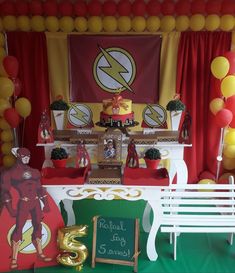 a birthday party set up with balloons and decorations