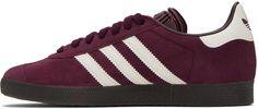 Low-top suede sneakers in burgundy. · Lace-up closure · Logo embossed at tongue · Padded collar · Signature serrated stripes at sides · Logo embossed at heel tab · Grained faux-leather lining · Treaded rubber sole Supplier color: Maroon/Chalk white Burgundy Gazelle, Burgundy Lace, Chalk White, Original Clothes, Suede Sneakers, Luxury Streetwear, Low Top, Adidas Originals, Designer Fashion