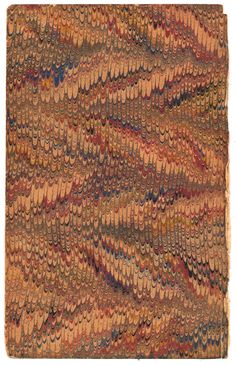 an old rug with many different colors and patterns