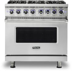 a stainless steel stove with six burners and four ovens on the front side