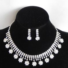 Bridal Wedding Silver Tone W. Clear Rhinestone Necklace, Drop Earrings Set The Necklace Measures Approx: 13.1/2"L - 5" Extender 1" Drop Earrings Measure Approx. 1"L Pierced With Bullet Disc Backs You Will Receive This Item Even More Beautiful Than The Pictures! :) An Amazing Set For All Occasion Cheap Women's Rhinestone Necklaces, Cheap Rhinestone Necklaces For Anniversary, Cheap Cubic Zirconia Rhinestone Necklace For Parties, Affordable Costume Jewelry Necklace With Sparkling Stones, Cheap Rhinestone Costume Jewelry Necklace For Gift, Cheap Statement Rhinestone Necklace With Bling, Cheap Rhinestone Necklace For Anniversary, Cheap Rhinestone Costume Jewelry Necklace, Diamond Necklace Set With Price