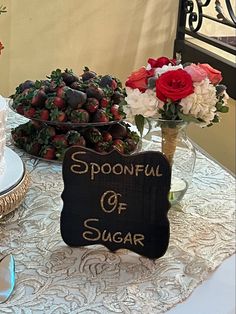 a table topped with lots of different types of cakes