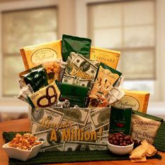 a gift basket filled with snacks on top of a table