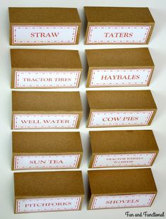 six brown boxes with labels on them sitting next to each other in front of a white background