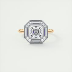 an octagonal cut diamond ring set in yellow gold