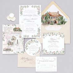 wedding stationery with flowers and greenery on the front, white envelopes and matching cards