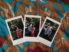 three polaroid photos of people in red dresses on a floral print blanket with blue and pink flowers