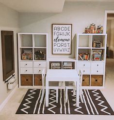 a living room with white furniture and no title sign