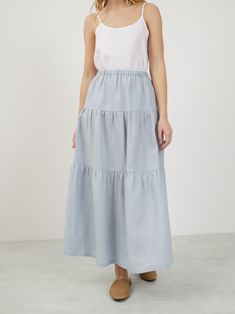 LILA is a maxi linen tiered skirt. DETAILS - Maxi length - Elasticated  - Tiered design - 100% lightweight European linen fabric - Cut and sewn to order just for you in our studio COLOR - Bluestone, you can also choose other colors above SIZING & FIT - Fits true to size - Model is 5'8" / 173cm and wearing a size S CARE FOR LINEN - Machine wash up to 30ºC/86ºF gentle cycle - Lay flat to dry or tumble dry low - Warm iron if needed - Do not bleach SIZE GUIDE Size conversion guide Size XS (US 0-2, I Maxi Linen Skirt, Skirt Details, Studio Color, Langer Rock, European Linens, Linen Skirt, Tier Skirt, Tiered Skirt, Body Measurements