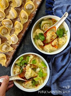 two bowls filled with dumplings and vegetables next to a tray of wontons