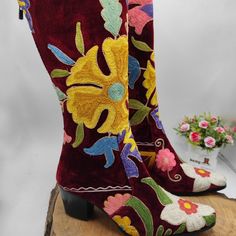 Cowboy Style Womens Boots. What Is Size ? - 9 Us Womens, 40 Eu Womens. What Is Material ? - Interior Lining Is Genuine Leather. - Outside Lining Is Hand Embroidered 1960s Vintage Material. What Is It ? - Unique Vintage Boots. There Is No More Same Boots. Only 1 Is Available. What Is Heel Height ? - 2 Inches. What Is Closure ? - Thete Is Zip On Back Of Boots. When Did I Made ? - 2023, Just Made It. We Have Door To Door Express Shipping. F You Have Any Questions Please Feel Free To Aske. Thank You Multicolor Heeled Boots With Round Toe For Winter, Multicolor Round Toe Heeled Boots For Winter, Red Bohemian Boots For Fall, High Heel Winter Festival Boots, Bohemian Winter Boots With Pointed Toe, Traditional Handmade Closed Toe Boots, Winter Festival Boots With Closed Toe, Festival Knee-high Boots With Round Toe, Traditional Handmade Round Toe Boots