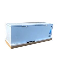 an ice chest sitting on top of a wooden pallet in front of a white background