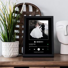 an image of a man and woman on their wedding day with headphones in front of them