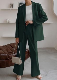 This Sophisticated Working Woman Blazer & Pants Suit Set is crafted from premium fabrics and attention to detail. The slim-fit blazer and tailored trousers are designed for both comfort and style, making it perfect for the working woman. The custom-made lining and secret pocket make it a practical choice for business meetings. Look professional and stylish with this must-have suit set. 95% Polyester, 5% Elastane Care instructions Machine Wash Size Chart XS = Dress 0-2, Bust, 31"-32.5", Waist 23" Latest Trendy Suits Women, Tailored Pantsuit For Business Casual In Fall, Tailored Fall Pantsuit For Business Casual, Women’s Pant Suit Outfit Formal, Semi-formal Fall Pantsuit With Pressed Crease, Semi-formal Pantsuit With Pressed Crease For Fall, Solid Color Fall Business Pantsuit, Solid Color Business Pantsuit For Fall, Solid Business Pantsuit For Fall